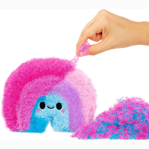 A fluffie stuffiez rainbow with it's thread being pulled by a child's hand from off screen